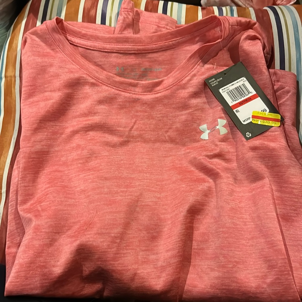 I am selling an under armor shirt. It is the size xs. It is pink.
